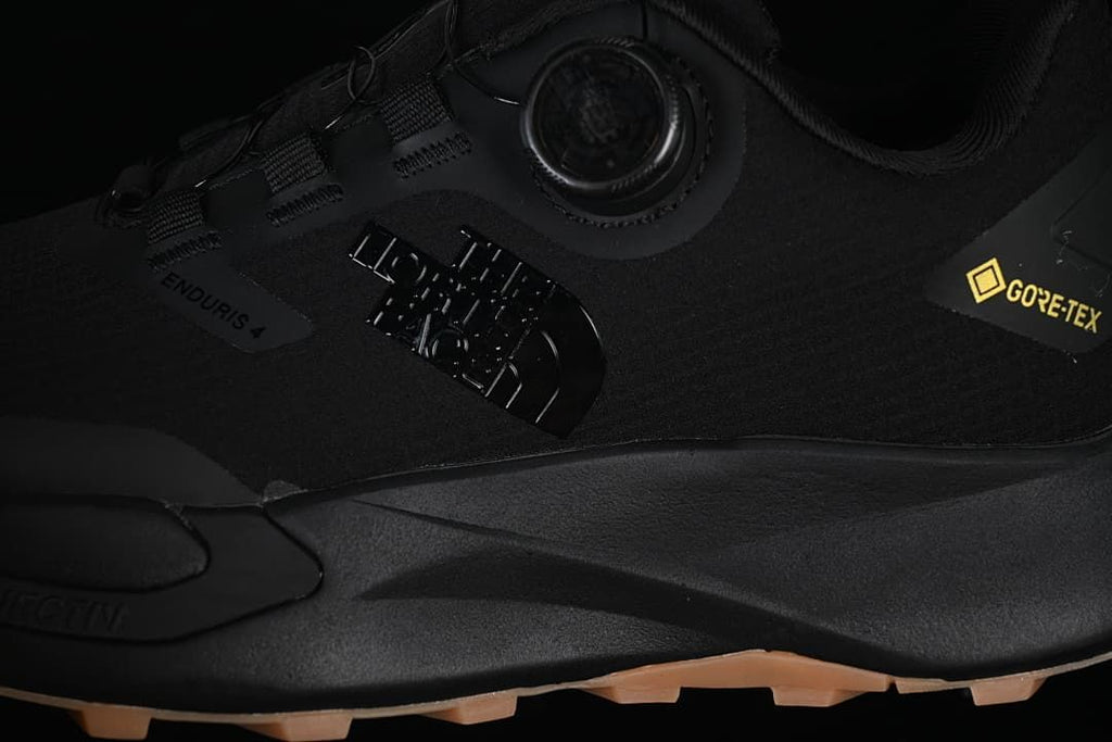 Close-up of the shoe side with Vectiv, Enduris, and GORE-TEX markings and dial closure.