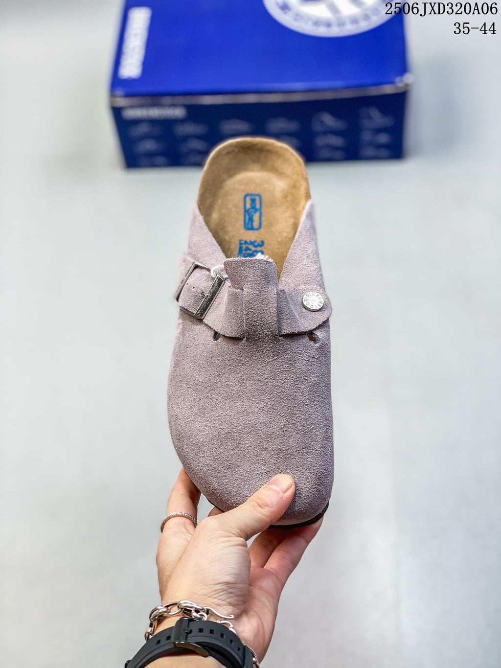 Top view showing the clog's adjustable buckle and contoured footbed