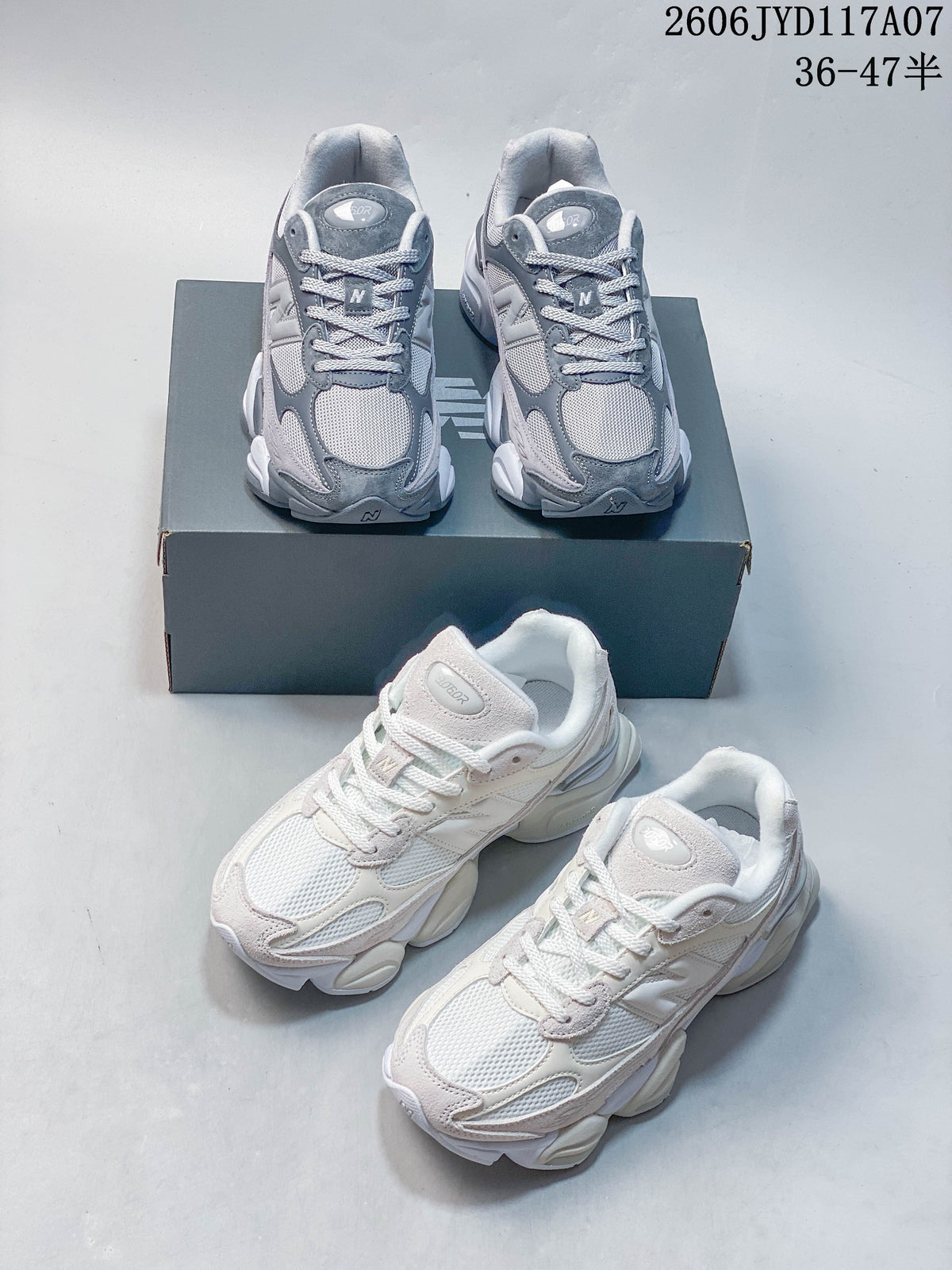 Gray and white New Balance 9060 sneakers photographed together.