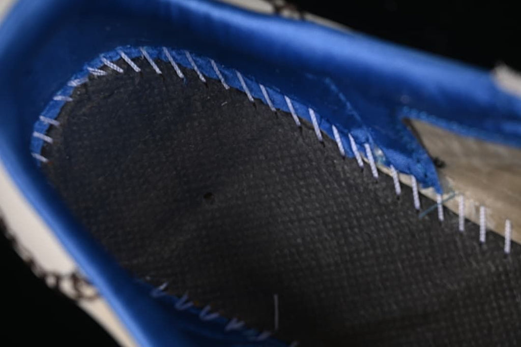 Close-up of the sneaker interior and stitched lining.
