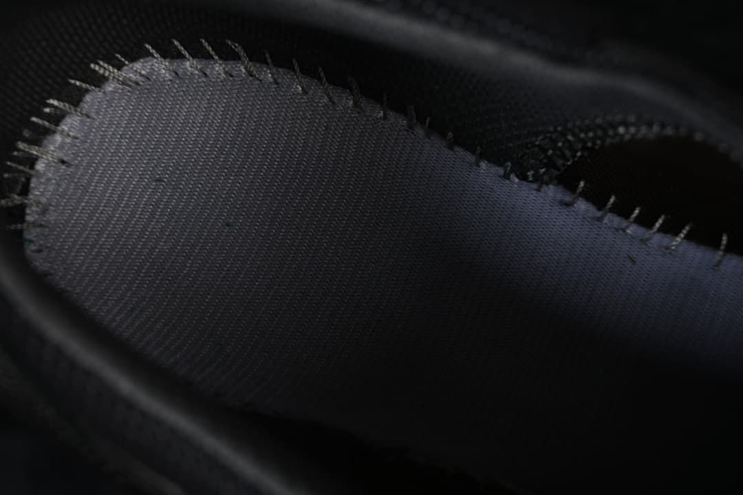 Close-up of a dark interior shoe panel