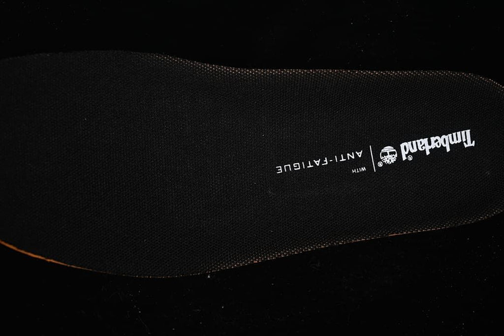 Close-up of the black insole with Timberland and Anti-Fatigue lettering.