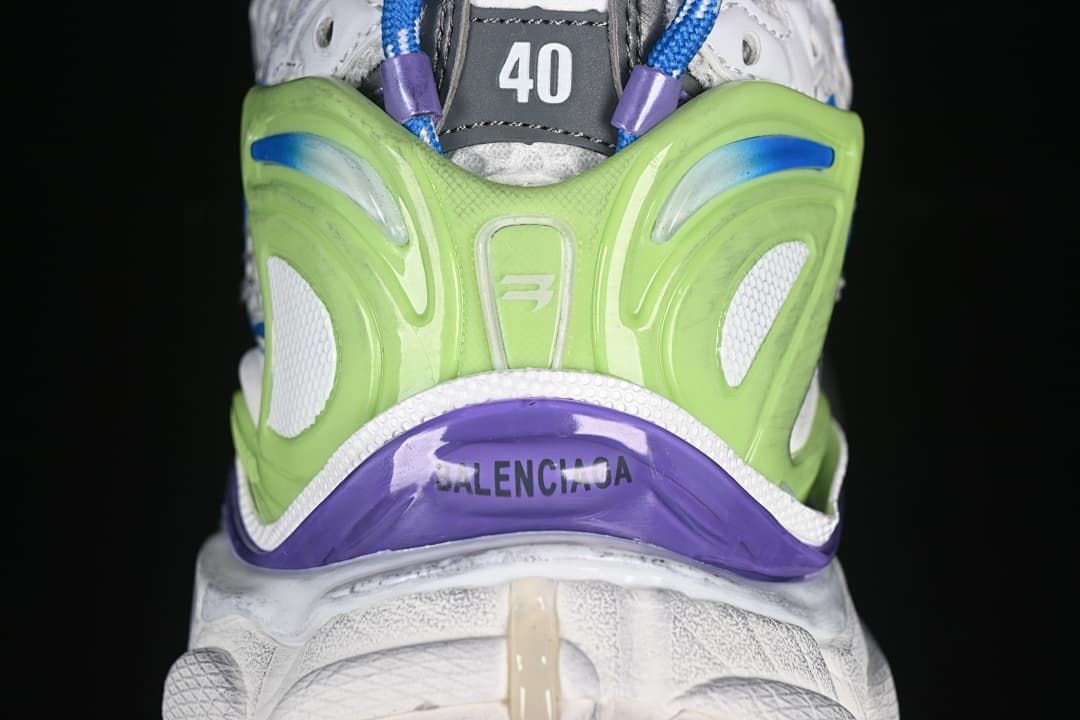 Rear close-up showing green heel support, purple trim, and a size 40 marking