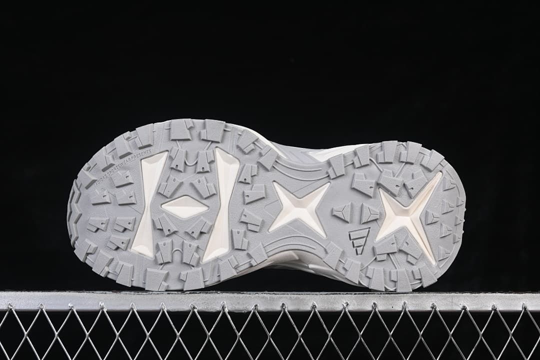 Underside view showing the grey patterned outsole