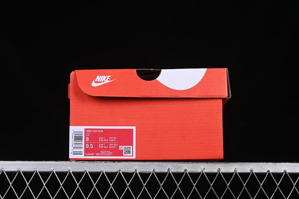 Box label displaying Nike V2K Run and style code HJ4497-400