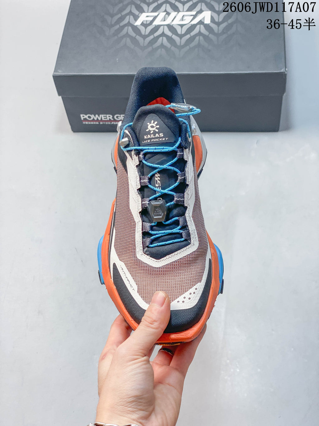 Top view of the Kailas trail shoe showing its blue quick-lacing system.