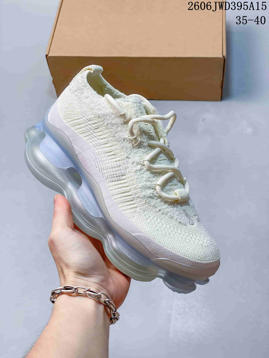 Cream knit Nike Air Max Scorpion-style sneaker with a translucent-looking sculpted sole; image also shows the text 35–40.