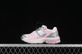 Side view of a pink, silver, and white kids’ New Balance 1906R sneaker with hook-and-loop straps.