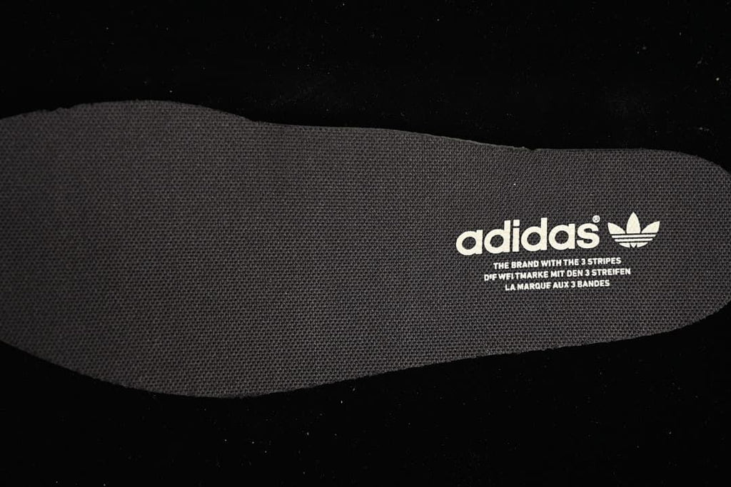 Close-up of the dark insole with adidas branding