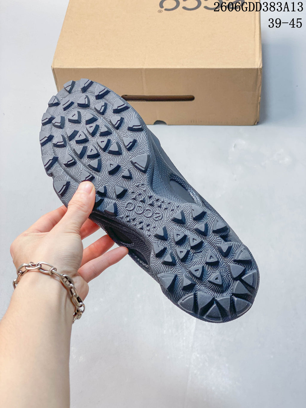 Close-up of the shoe's lugged outsole