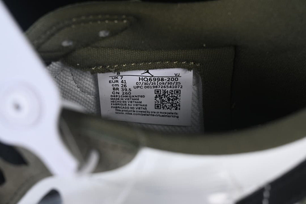 Size and style label inside the sneaker, showing EU 41 and HQ6998-200