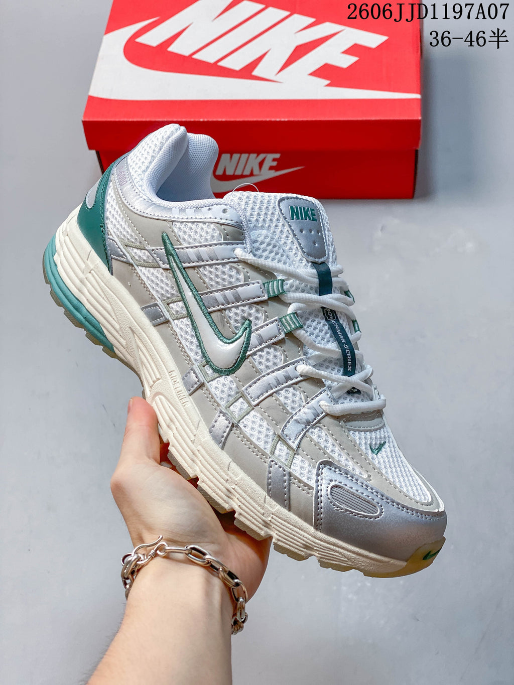 Angled side view of the sneaker showing its layered design and sculpted sole