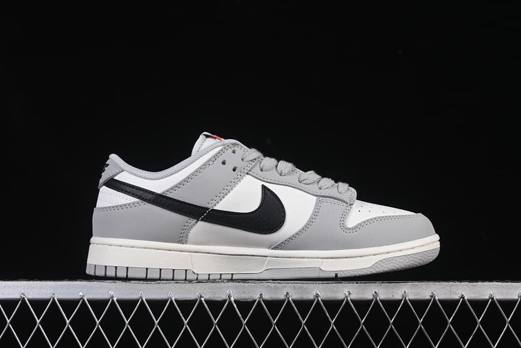 Side profile highlighting the black Swoosh and grey overlays