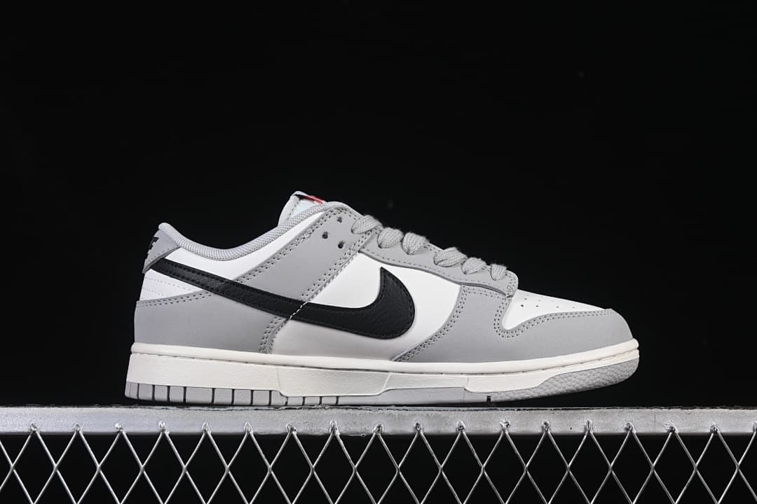 Side profile highlighting the black Swoosh and grey overlays