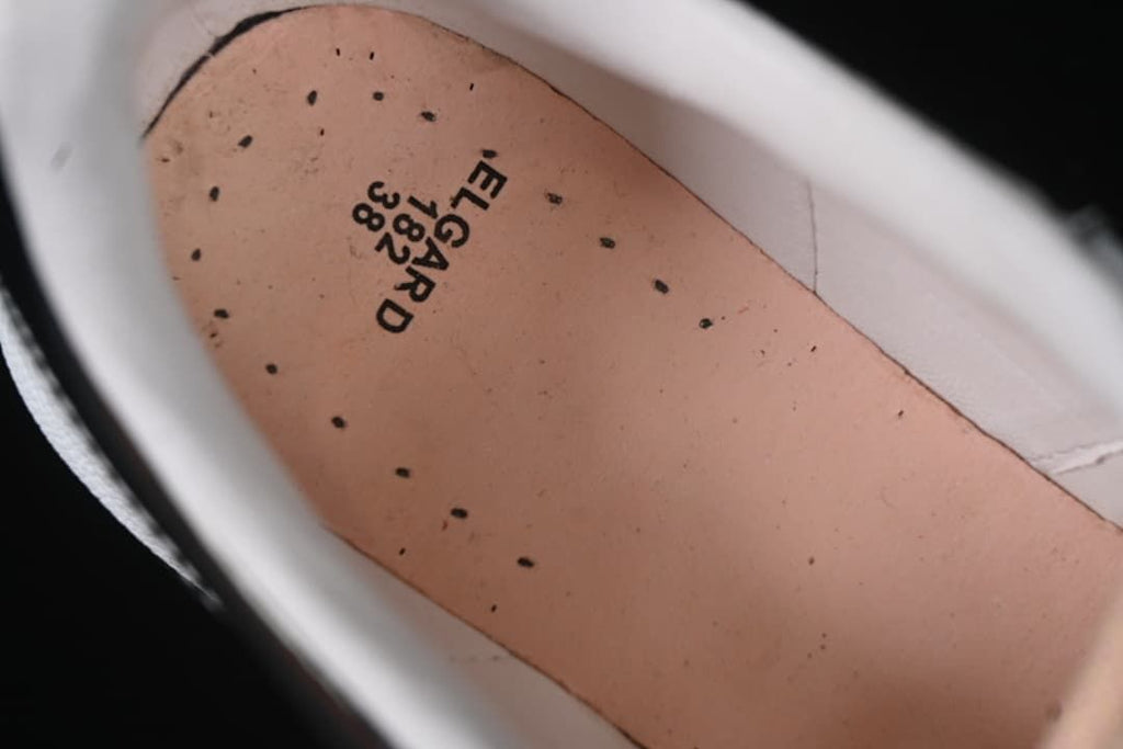 Interior view showing the insole and printed markings