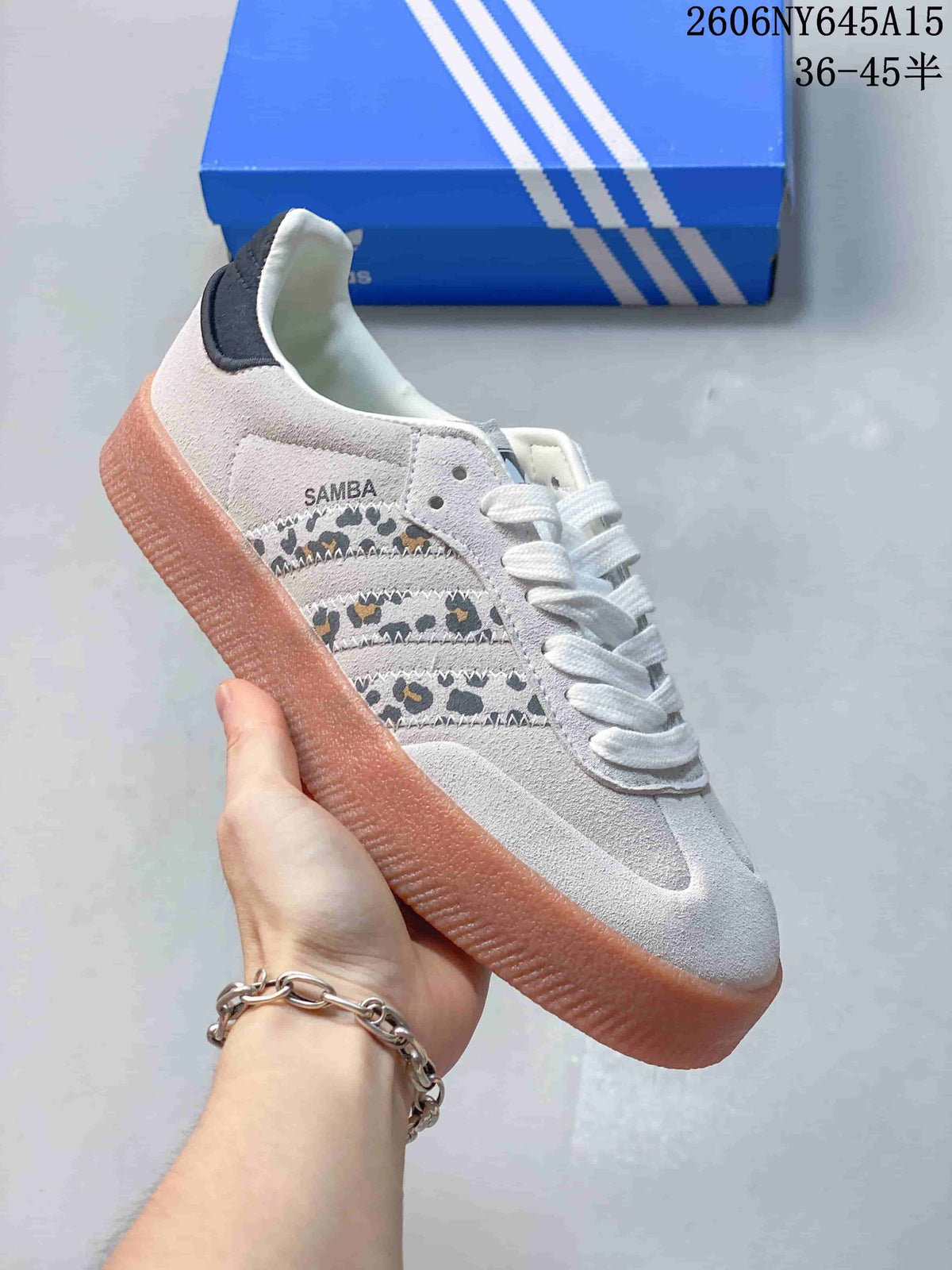 Close side view of the sneaker showing Sambae lettering and animal-print stripes