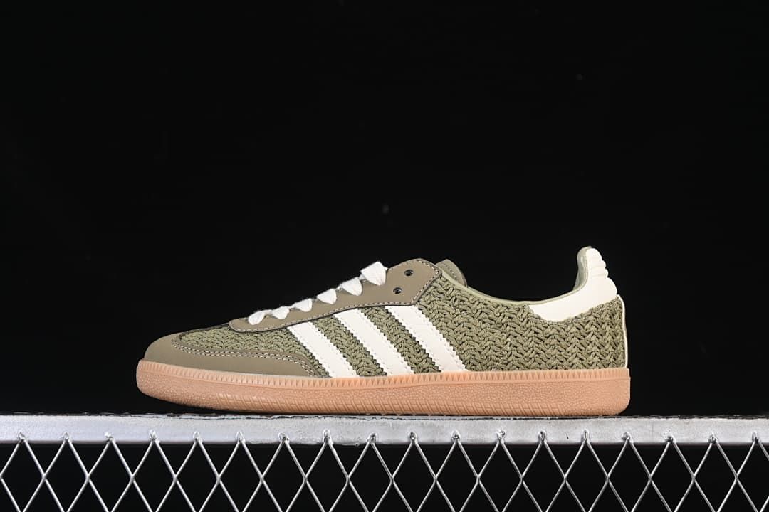 Side view of olive-green and white adidas Samba OG sneakers with a gum outsole