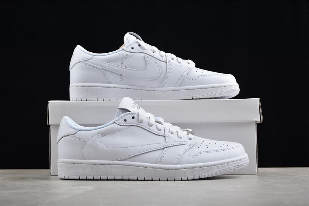 Pair of white sneakers displayed on a shoe box