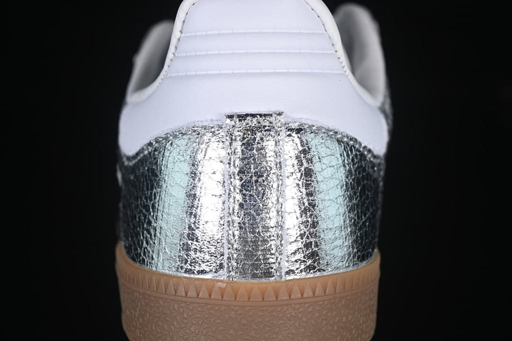 Rear view highlighting the silver heel panel and gum-colored outsole