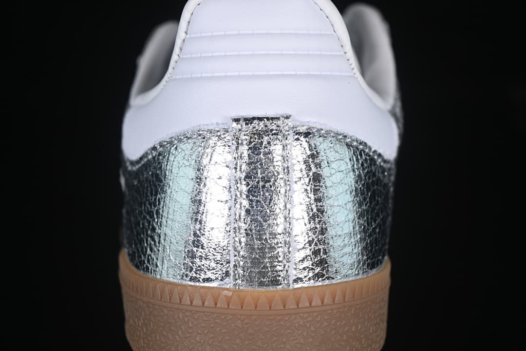 Rear view highlighting the silver heel panel and gum-colored outsole
