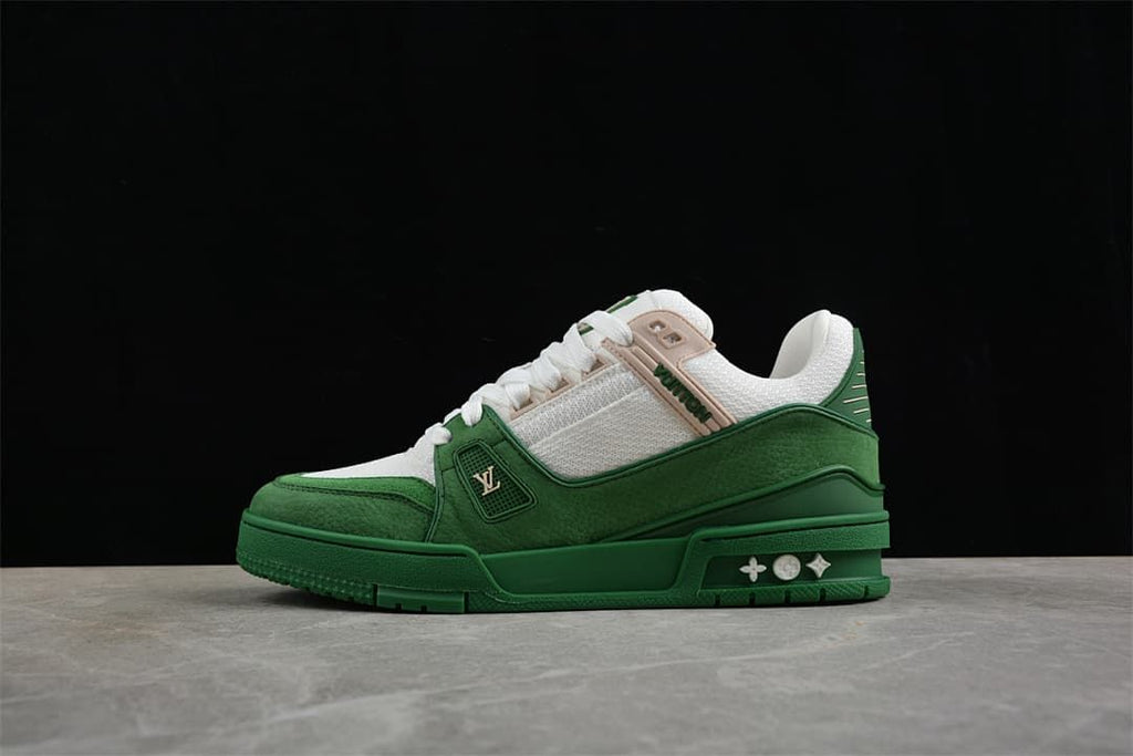 Side profile of the green and white sneaker against a dark background