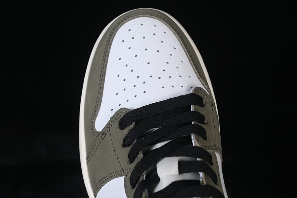 Top-down view of the perforated toe and black laces