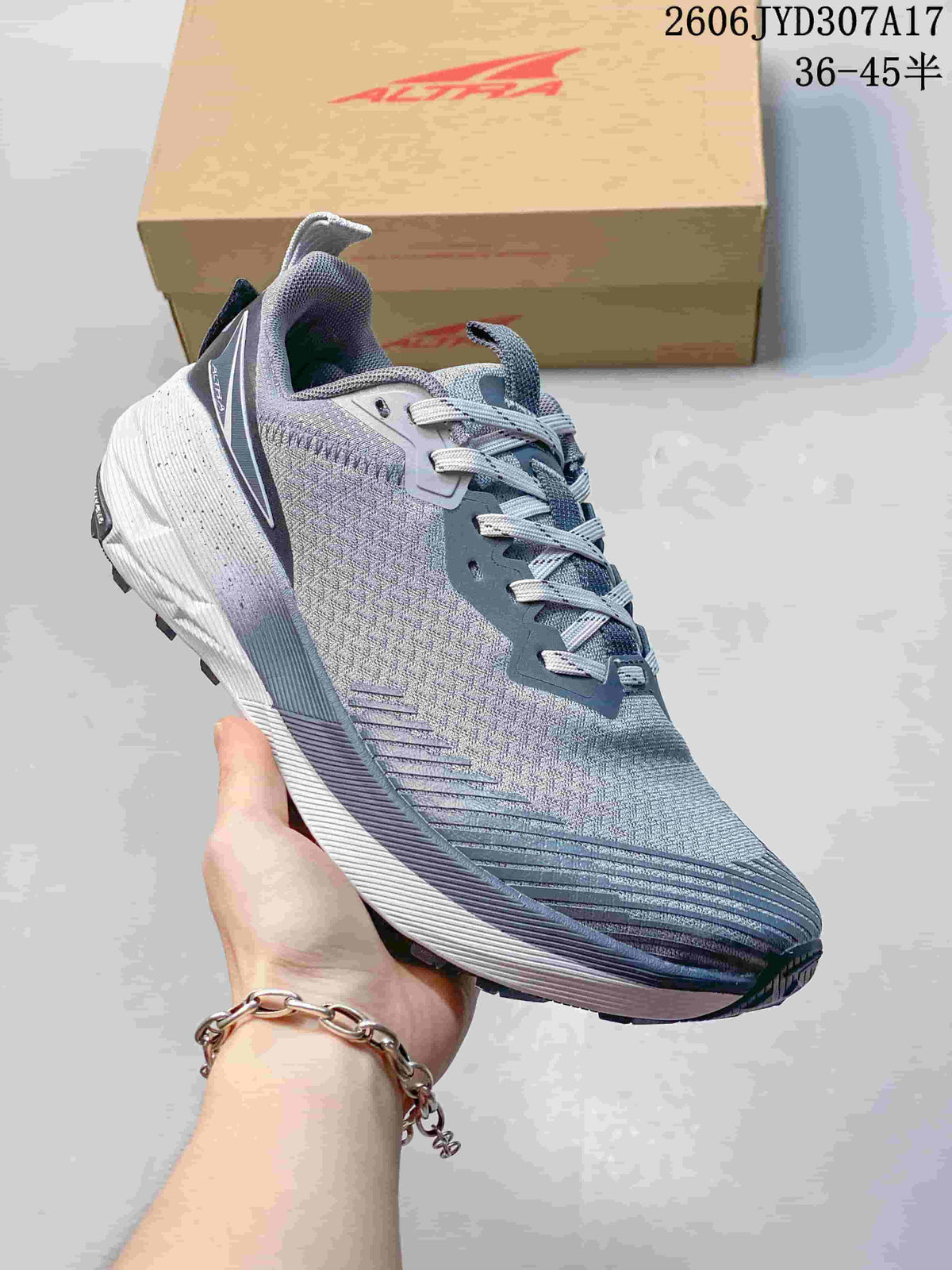 Angled side view of the gray Altra running shoe showing its upper and sole