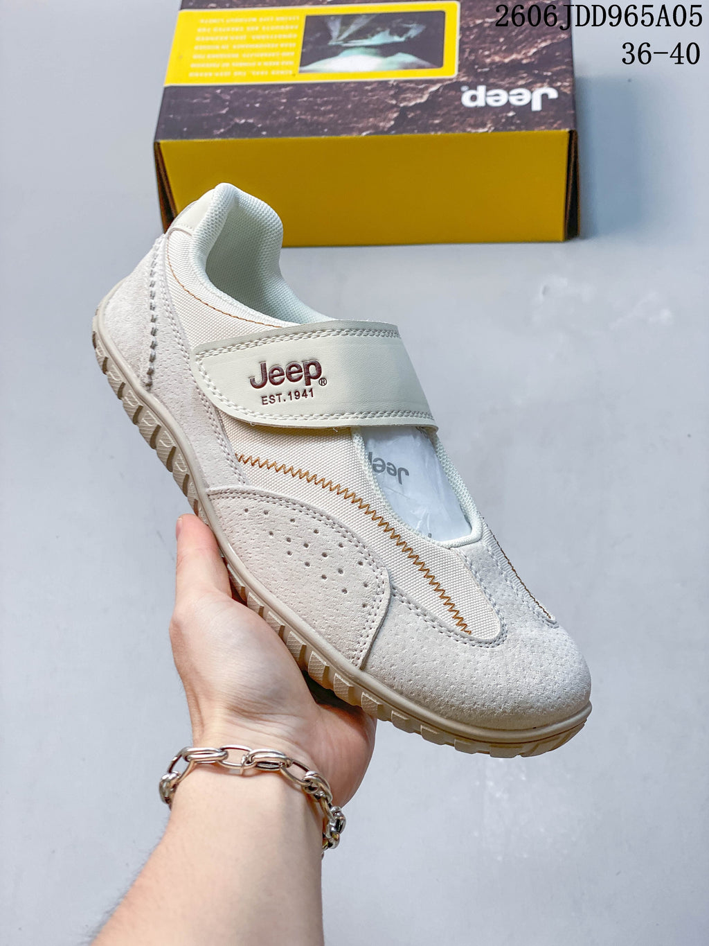 Angled view of the cream Jeep casual shoe with a hook-and-loop strap