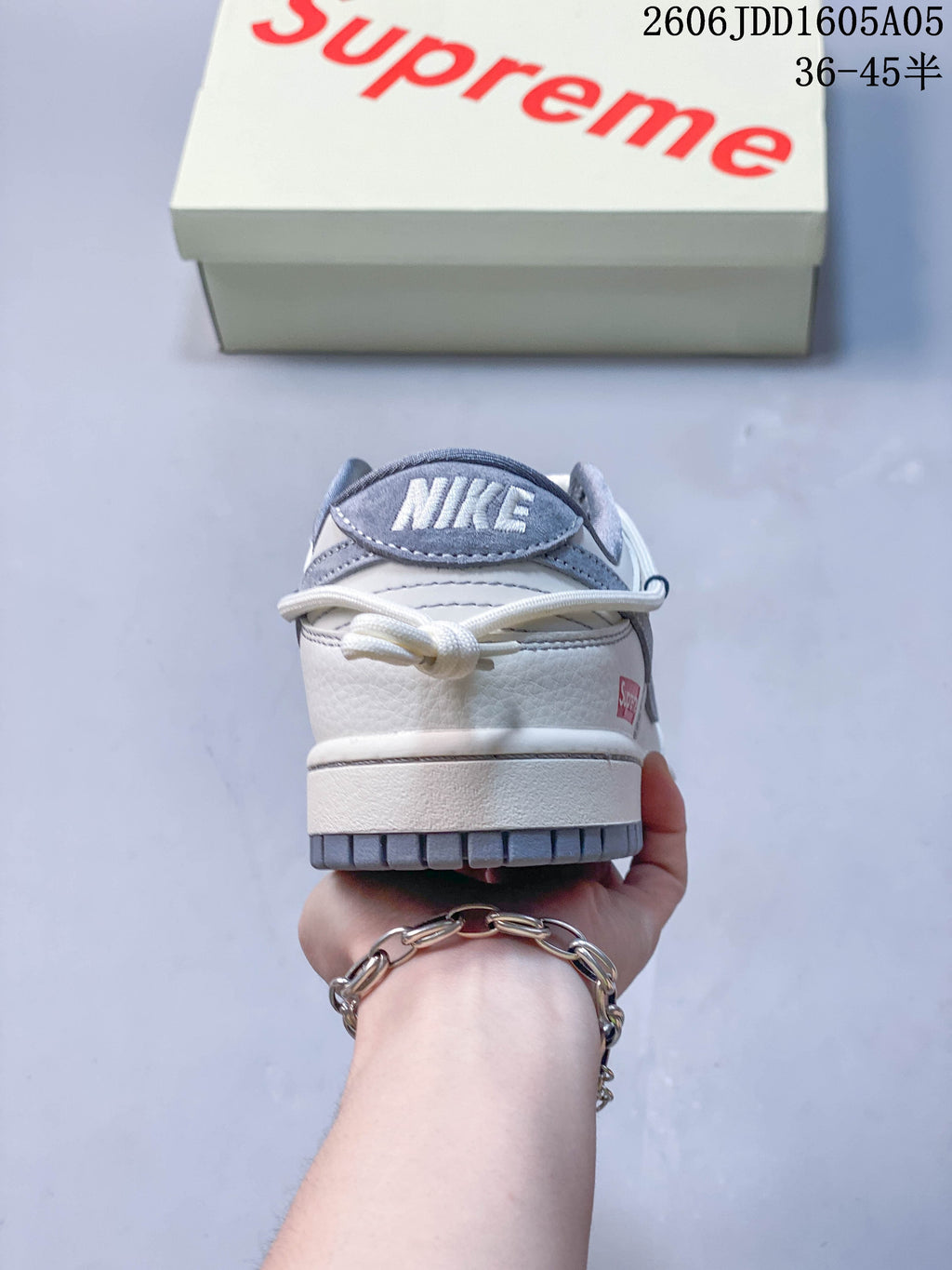 Rear view showing the heel details and grey outsole