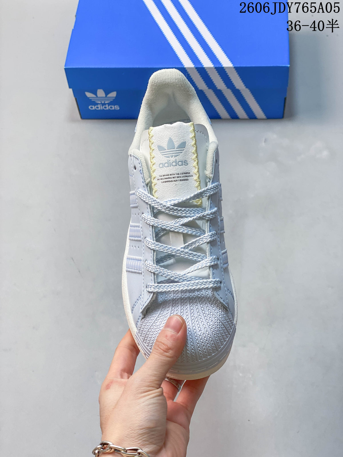 Front view showing the shell toe, laces and tongue