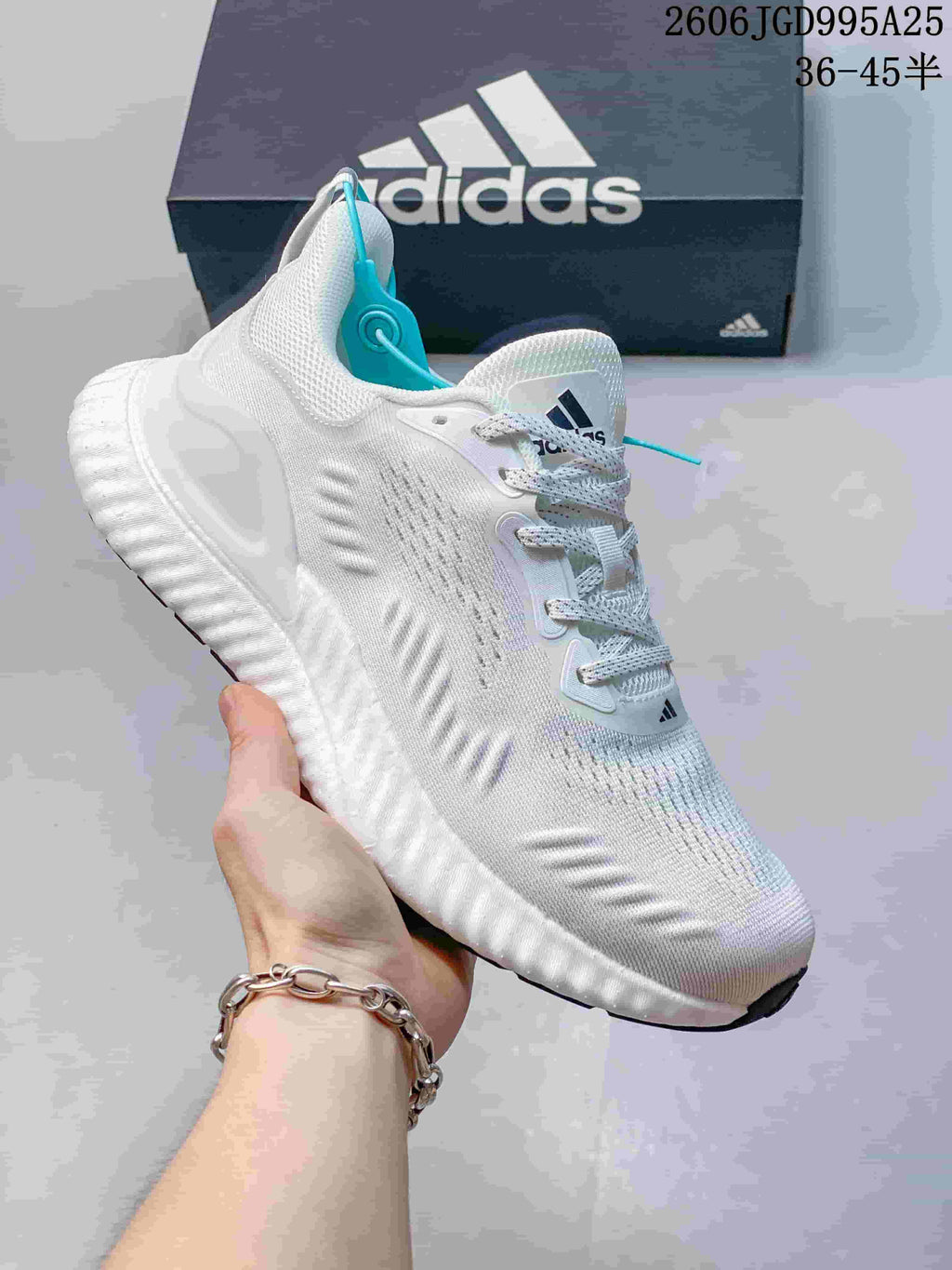 White adidas Switch FWD M sneaker with turquoise details and a sculpted sole