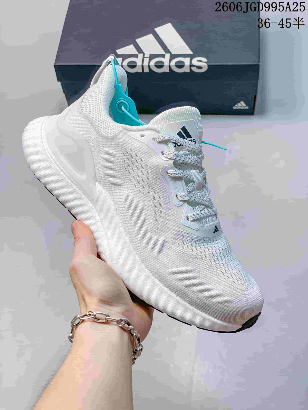 White adidas Switch FWD M sneaker with turquoise details and a sculpted sole