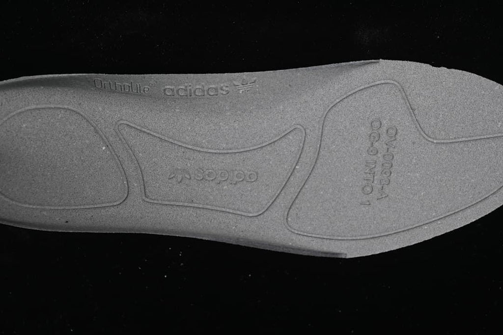 Close-up of the molded outsole on the adidas Superstar sneaker.