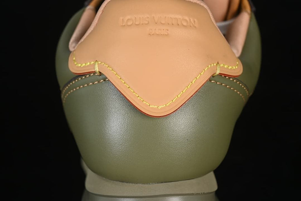 Rear view showing the tan heel tab and olive green heel panel