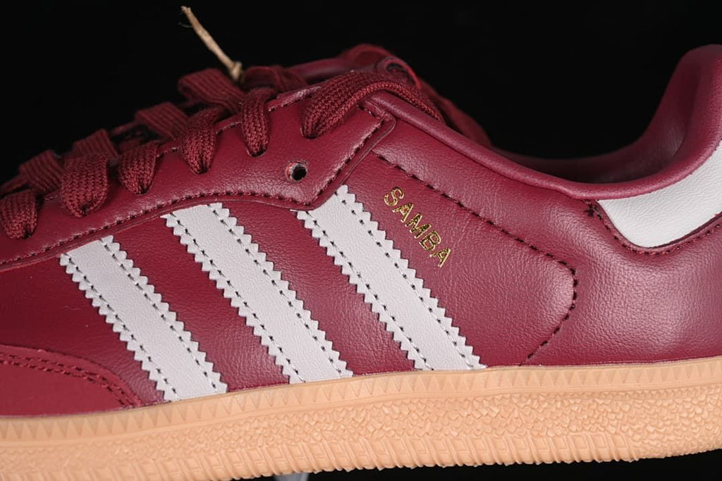 Close-up of the Samba side marking, white stripes and gum-colored outsole