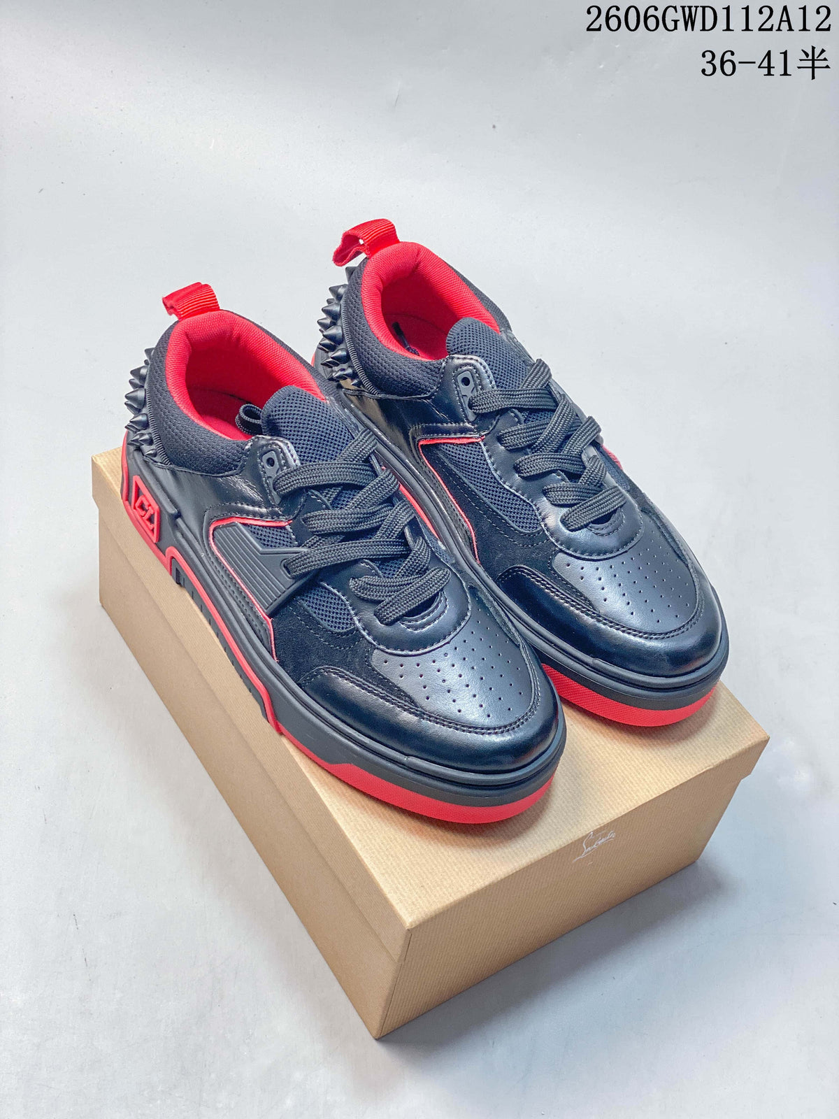Pair of black and red Funnyto low-top sneakers with spiked heel detailing