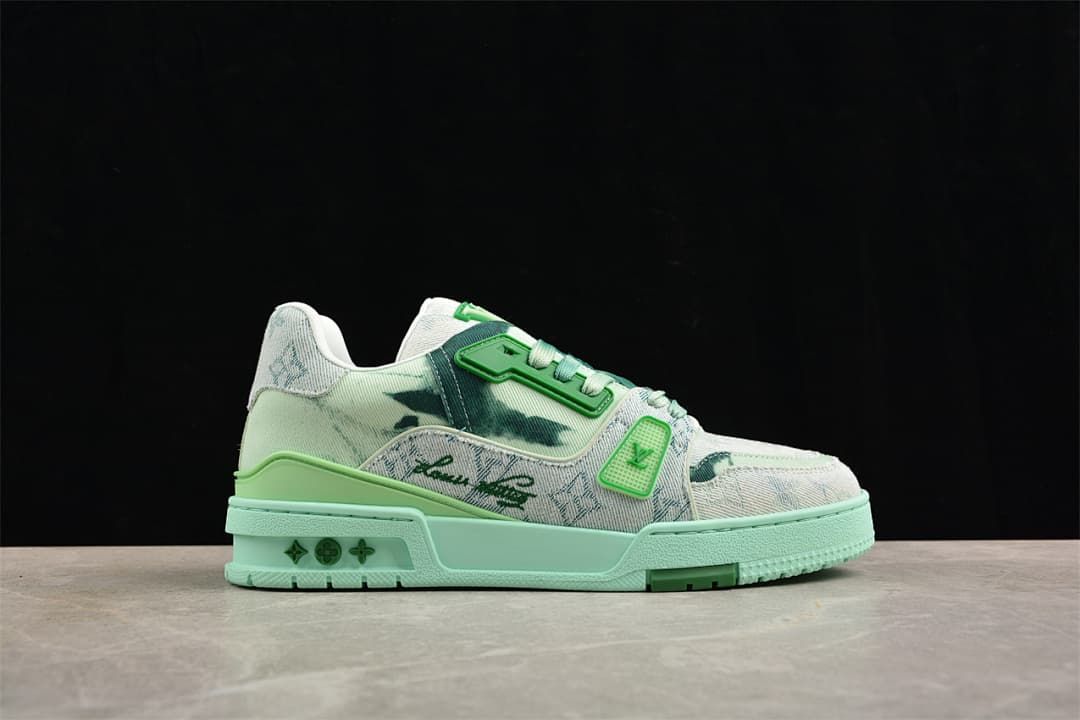 Opposite side profile of the sneaker with patterned panels and a mint-green sole.