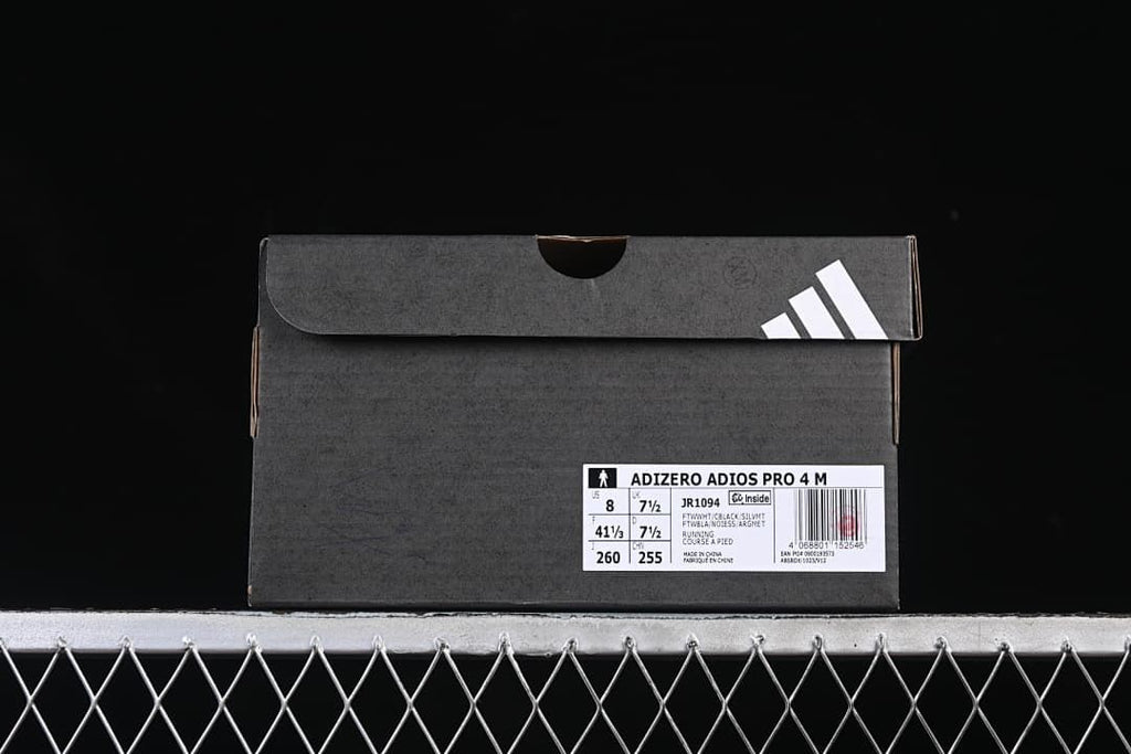 Shoe box label identifying the model as Adizero Adios Pro 4 M, code JR1094, with sample size details.