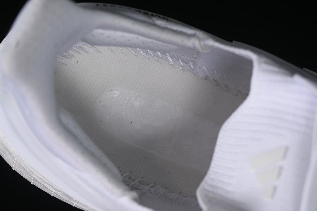 View inside the shoe showing the lining and footbed.