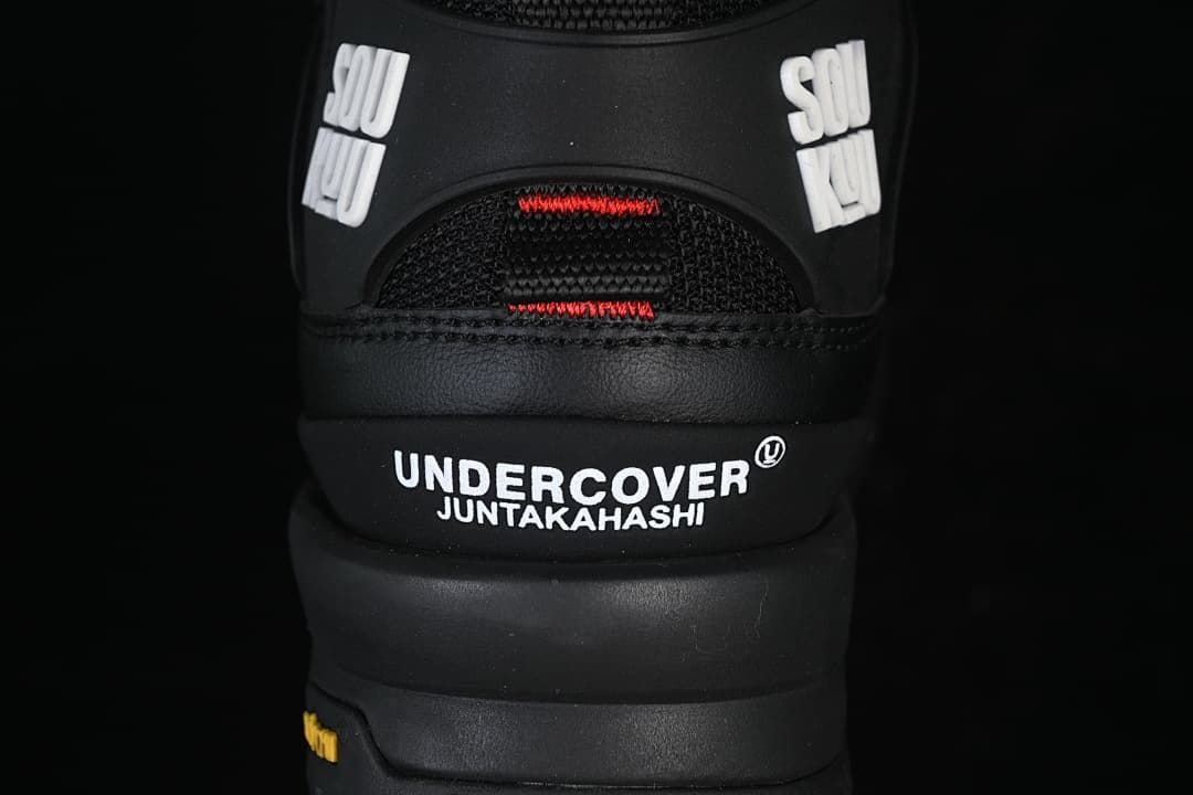 Rear view showing heel branding and red accents