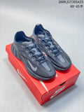 Pair of dark charcoal Nike Ava Rover low-top shoes on a red shoebox
