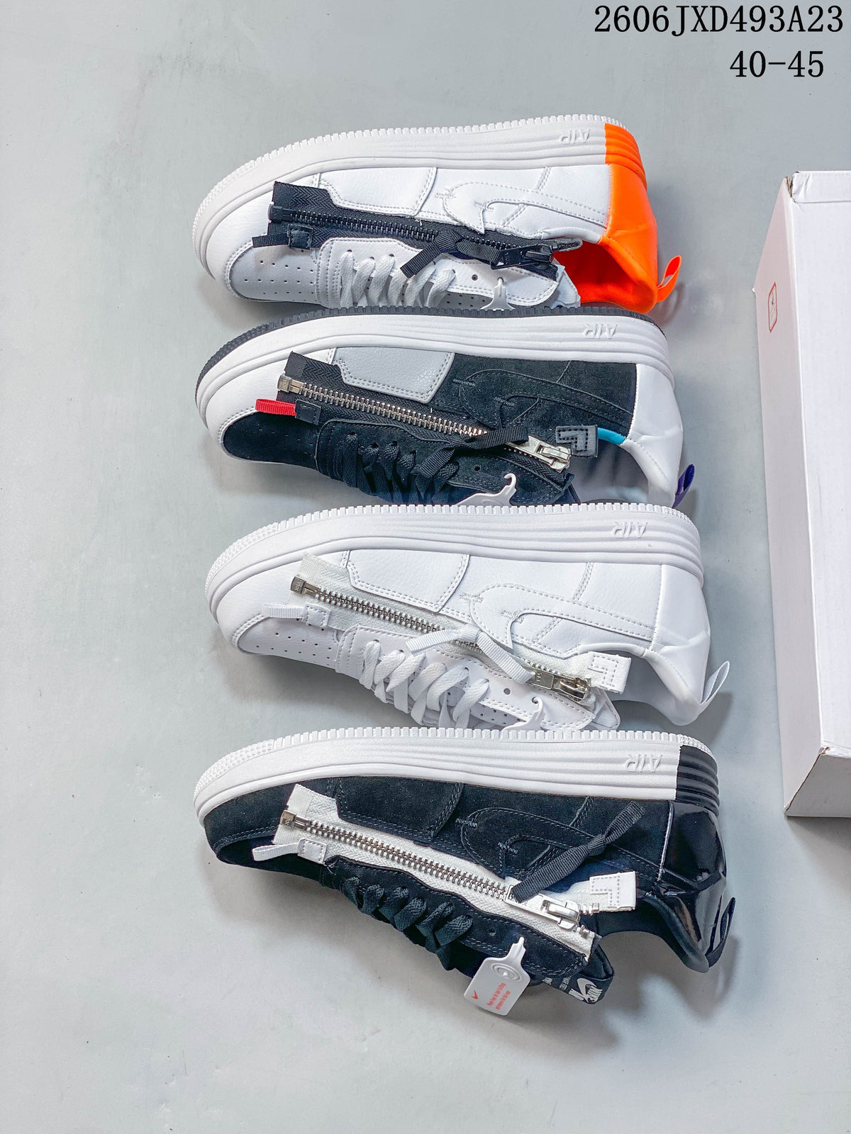 Four low-top sneaker color variations shown side by side, all with side zippers