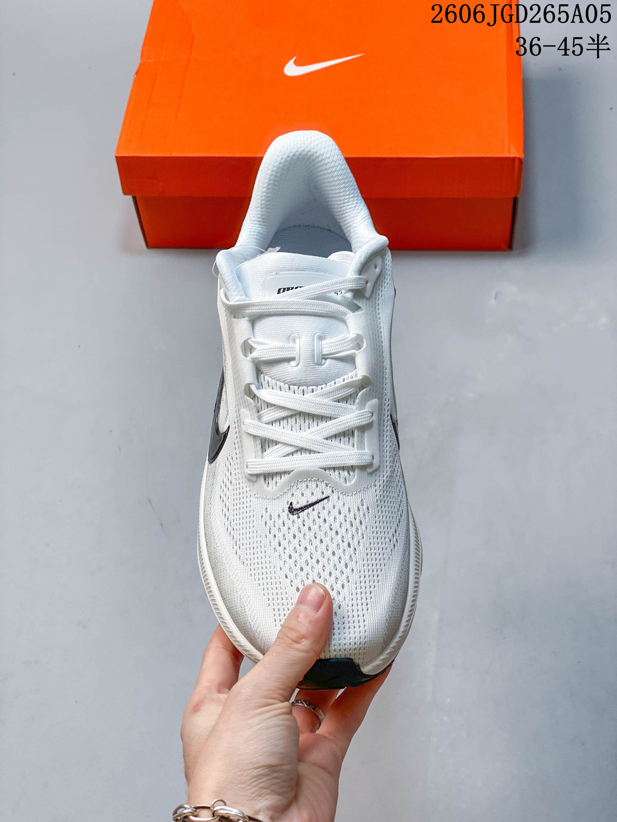 Front view of a white Nike Pegasus 42 running shoe with white laces