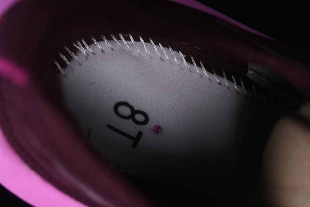 Close-up inside the shoe showing a printed size mark