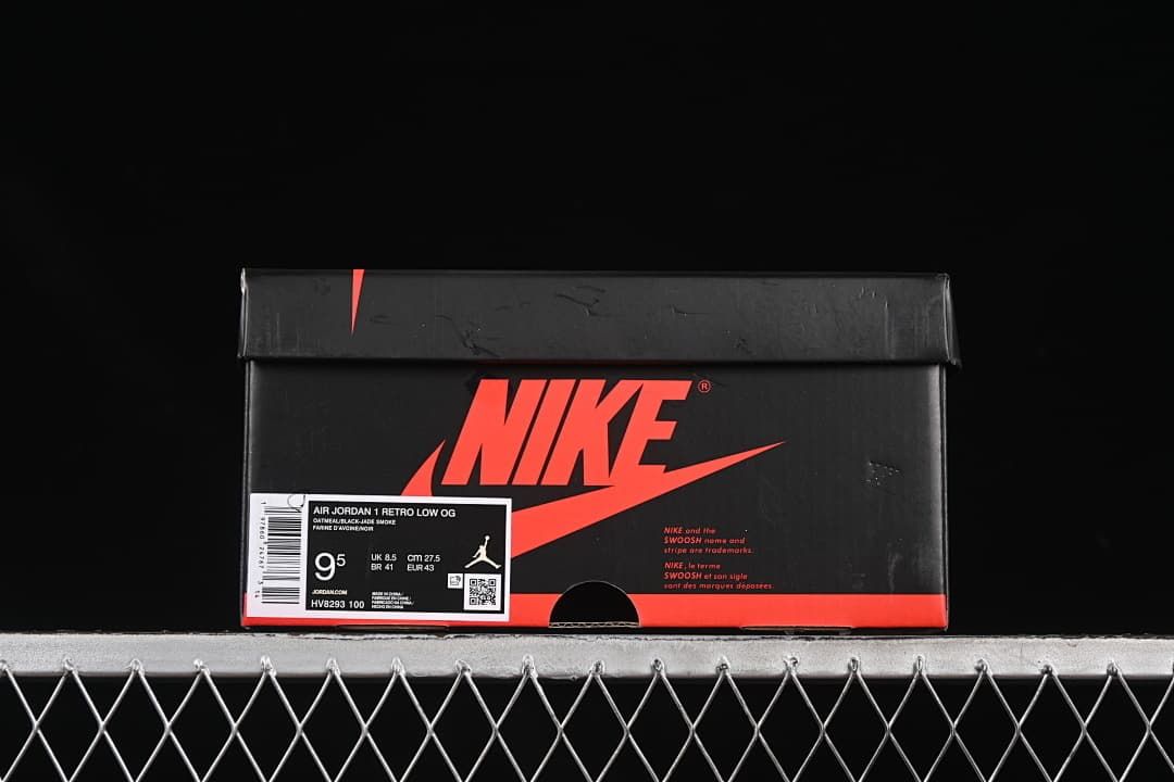 Black shoe box with a label identifying Air Jordan 1 Retro Low OG and EU 43