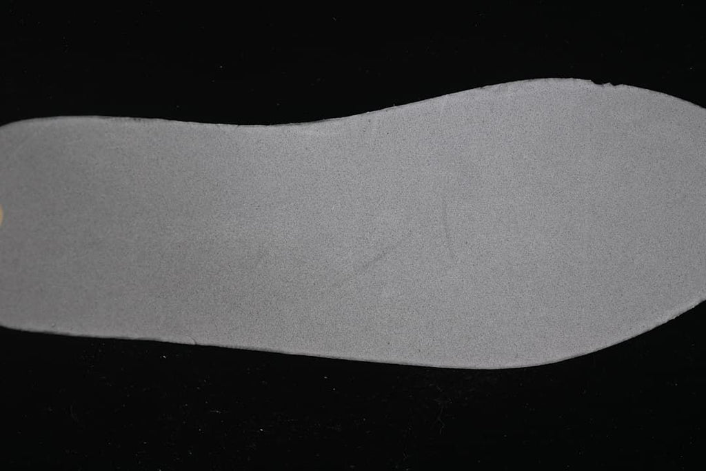 Close-up of the shoe's light-colored footbed.