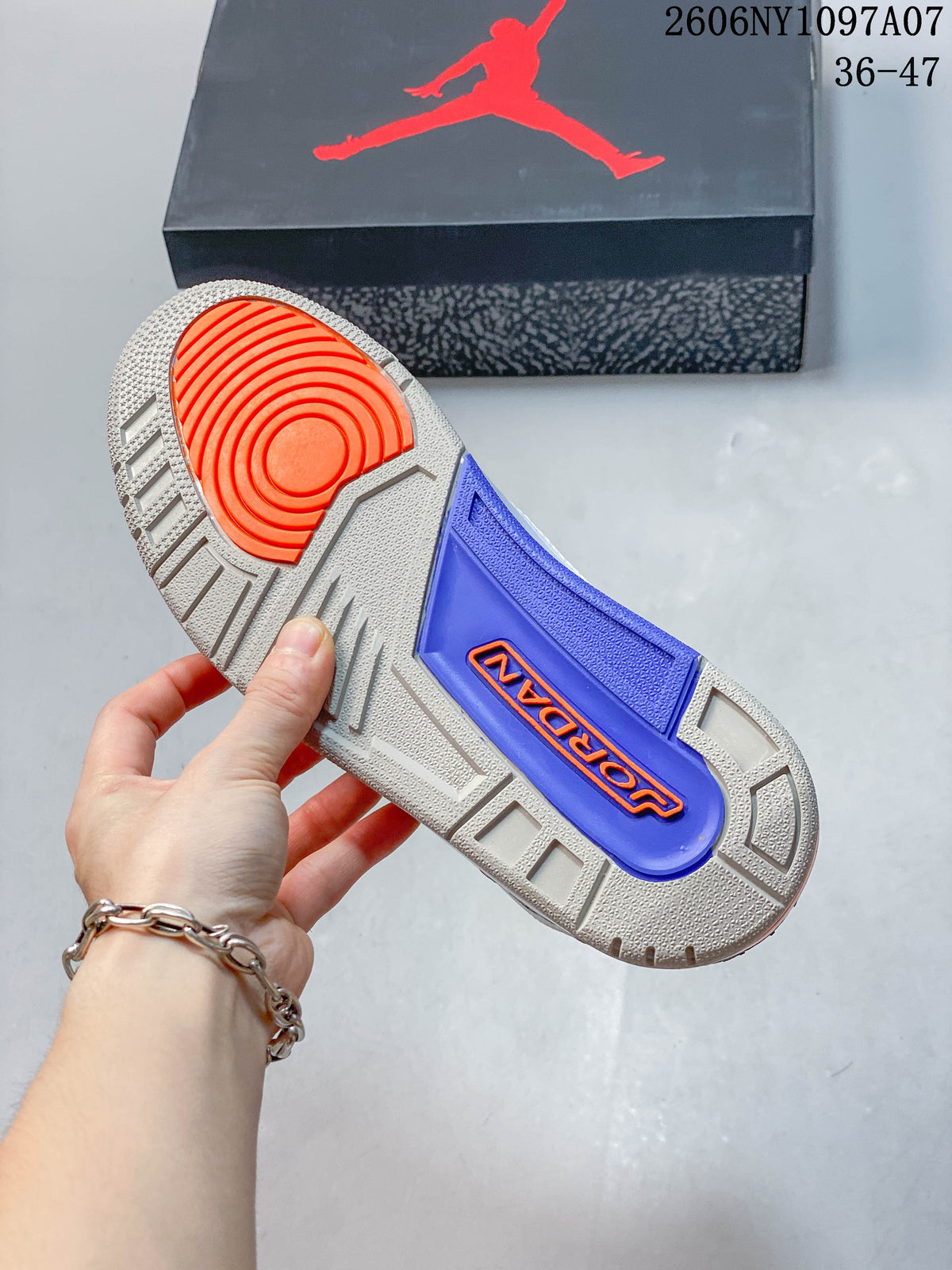 Outsole of the Jordan Air Jordan 3 Knicks sneaker with gray, blue, and orange sections