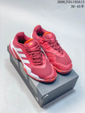 Pair of red Adidas Barricade 13 tennis shoes with white stripes and orange accents, shown on a shoe box.