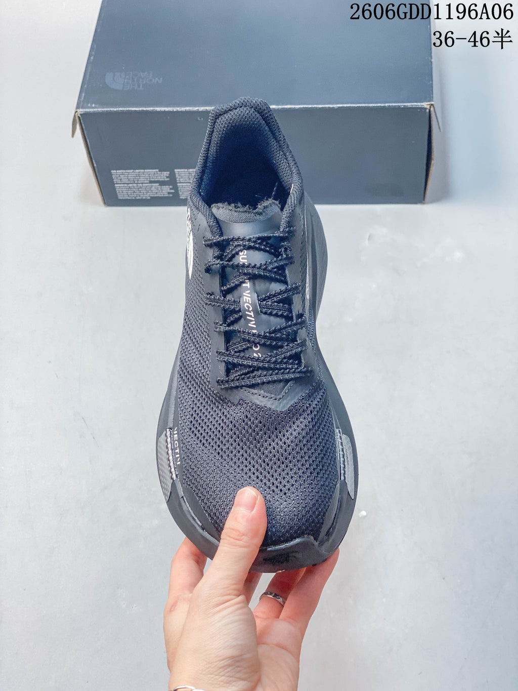 Top-down view of a gray lace-up trail shoe