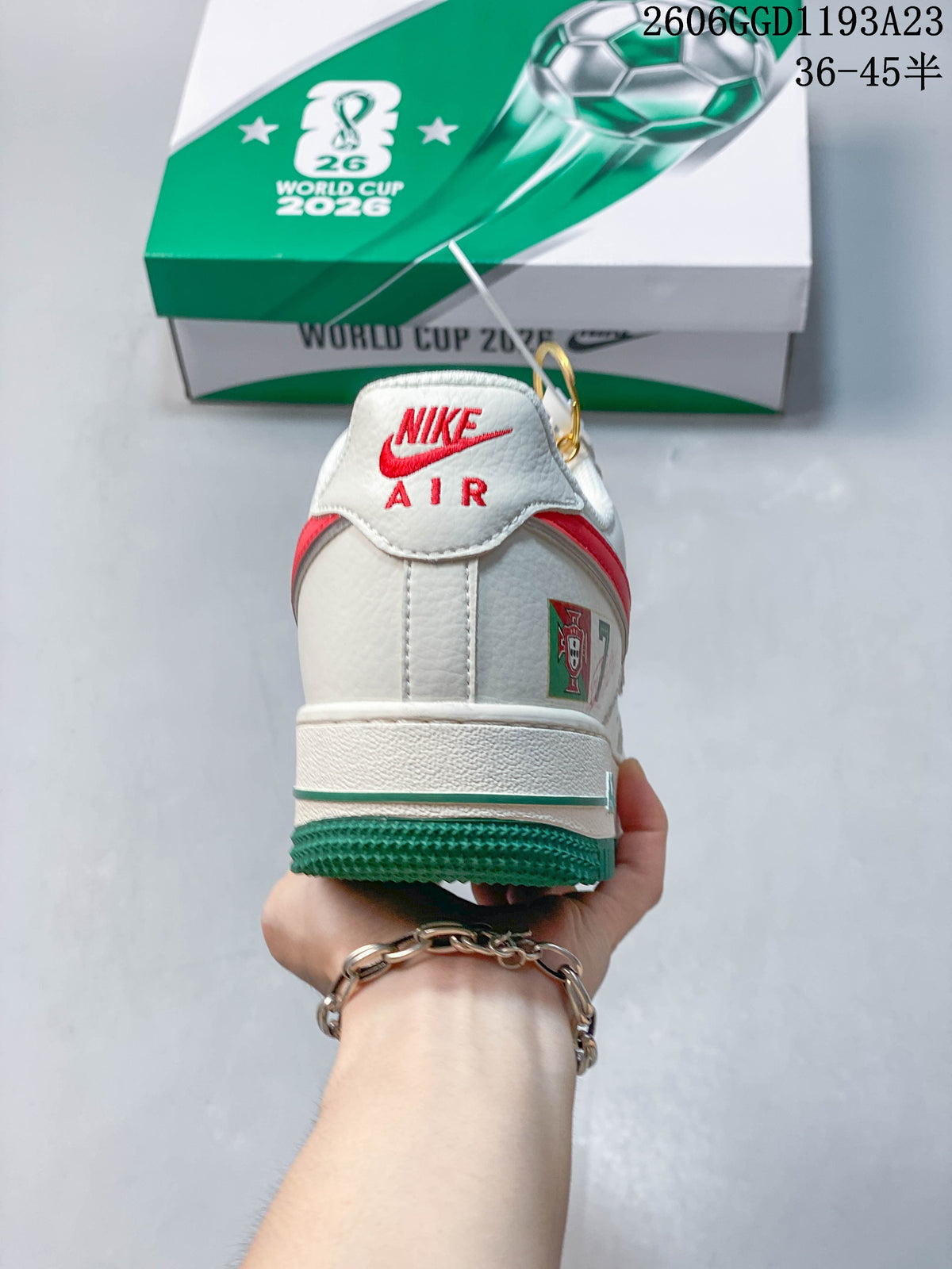 Rear view showing red Nike Air branding and Portugal-themed detail